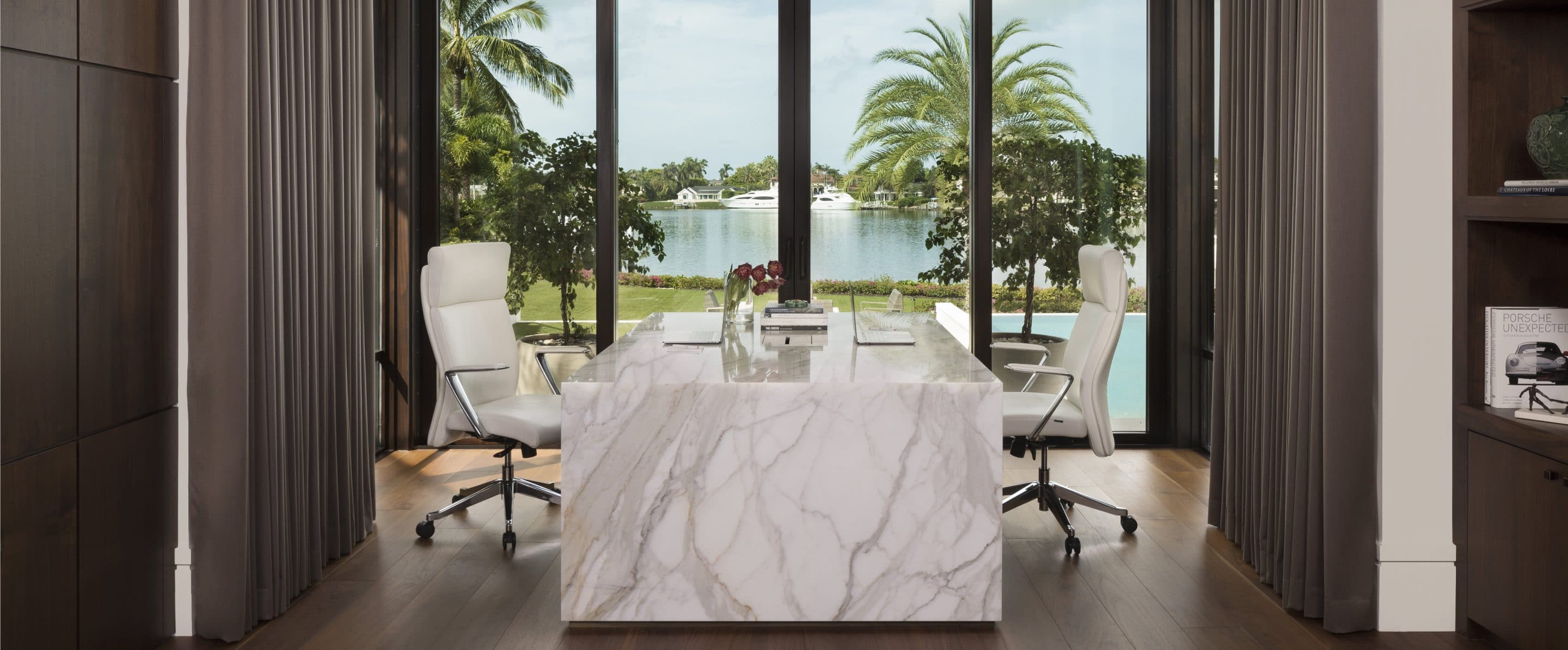 Study featuring a waterfall custom designed partner desk